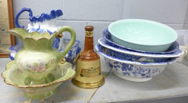 A collection of wash jugs and bowls and a Bell's whisky decanter **PLEASE NOTE THIS LOT IS NOT