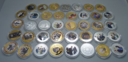 Thirty-eight gold and silver plated medallions with enamel detailing, featuring military battles and