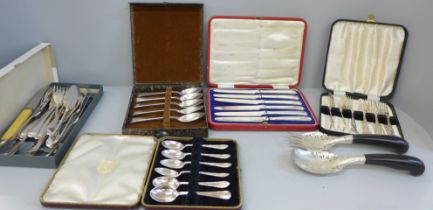 A collection of plated flatware including a box of Walker & Hall fish servers, other plated