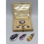 A silver and Blue John brooch and button set, boxed, and three Blue John pendants