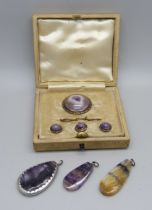 A silver and Blue John brooch and button set, boxed, and three Blue John pendants