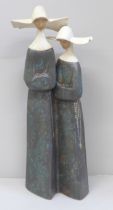 A Lladro figure of two nuns, 35cm