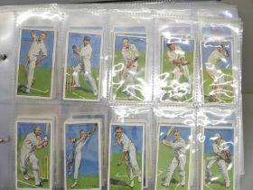 An album of ten complete sets of cigarette cards, including Players (Cricketers 1930, Game Birds and