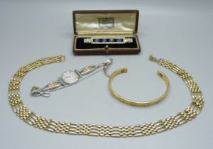 A lady's Citizen quartz wristwatch, an Art Deco brooch, cased (one stone loose), a gold-tone