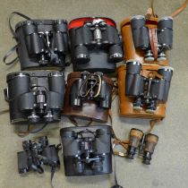 Nine sets of binoculars, seven cased