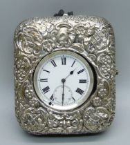 A silver pocket watch in a silver mounted travel case, a/f, case lacking back stand, second hand