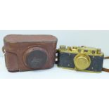 A Leica brass 1923 copy camera and leather case, made in Russia