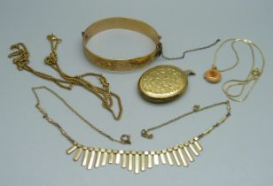 A 9ct gold metal core bangle, a rolled gold locket, a necklace, etc.