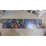 Two painted wooden fairground signs