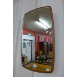 A teak framed mirror