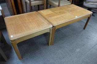 A Nathan teak coffee table and a lamp table