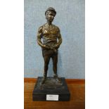 A bronze figure of a miner