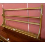 An Ercol Blonde beech plate rack