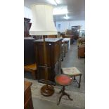 A beech standard lamp, a mahogany tripod wine table and a stool