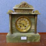 An early 20th Century French onyx mantel clock