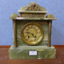 An early 20th Century French onyx mantel clock