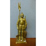 A brass companion set on figural knight stand