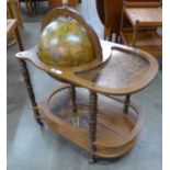 An Italian terrestrial globe cocktail trolley/cabinet