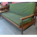 A Guy Rogers teak and green fabric upholstered settee/daybed, designed by George Fejer and Eric