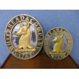 Two cast metal Whitbread & Company signs