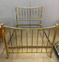 A Victorian brass double bed