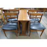 A G-Plan Fresco teak drop leaf table and four teak dining chairs