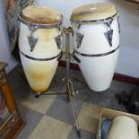 A pair of percussion drums on stand