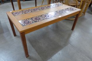 A Danish teak and tiled top rectangular coffee table
