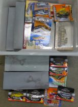 A box of die-cast and other model vehicles, boxed