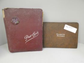 An album of photographic postcards, 1920s, views of Sandringham, military, etc., and an album of