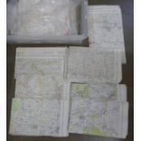 A box of Ordnance Survey and air maps (30+) and a collection of newspapers