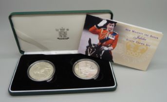 A Royal Mint Her Majesty The Queen Jubilee Silver Crown Set, 2002 Golden Jubilee, 1977 25p and