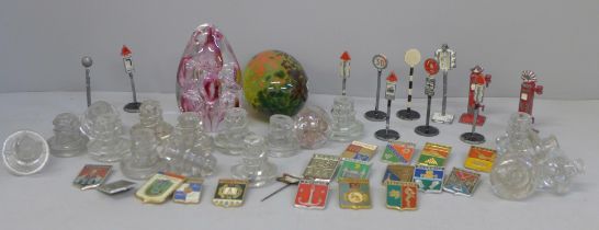 A collection of Soviet badges, glass drawer or cabinet knobs, M'dina and Langham glass