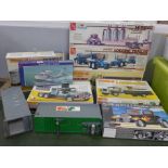 A collection of model kits, including Matchbox Ford Louisville, Peerless Roadrunner, White Road