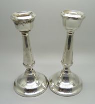 A pair of silver candlesticks, Birmingham 1931, 15.5cm