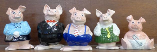 A set of five Wade Nat West piggy banks with stoppers