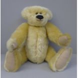 A Teddy bear with jointed limbs