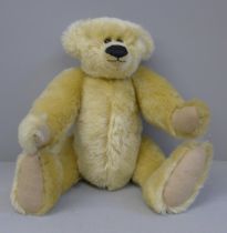 A Teddy bear with jointed limbs