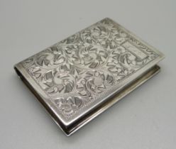 A sterling silver compact in the form of a book, with initials, 51mm x 68mm