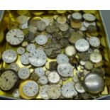 A collection of pocket and wristwatch movements