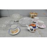 A pair of Geisha Girl cups and saucers, teapot, one other saucer, a Portugese pierced edge plate,