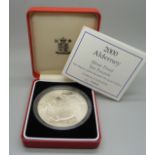 A Royal Mint 2000 Alderney Silver Proof Ten Pounds coin, boxed, with certificate no.0468, 155.55gms,