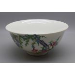 A hand painted Chinese bowl, depicting birds and flowers, six character mark to base, 13.5cm