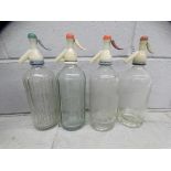 A collection of assorted glass bottles, mostly Victorian including medicine and some with labels,