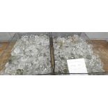 Two large boxes of over 530 cut glass and moulded glass stoppers, to fit scent and perfume