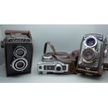 A Yashica 44 TLR, Lubitel 2 TLR and a Comet III camera