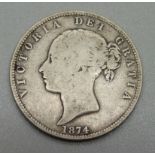 An 1874 Victoria half-crown coin