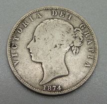 An 1874 Victoria half-crown coin