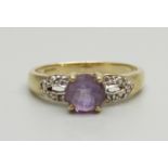 A 9ct gold, amethyst and diamond ring, 2.3g, N