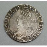 A Charles I shilling, c1644-1645, oval shield with CR above